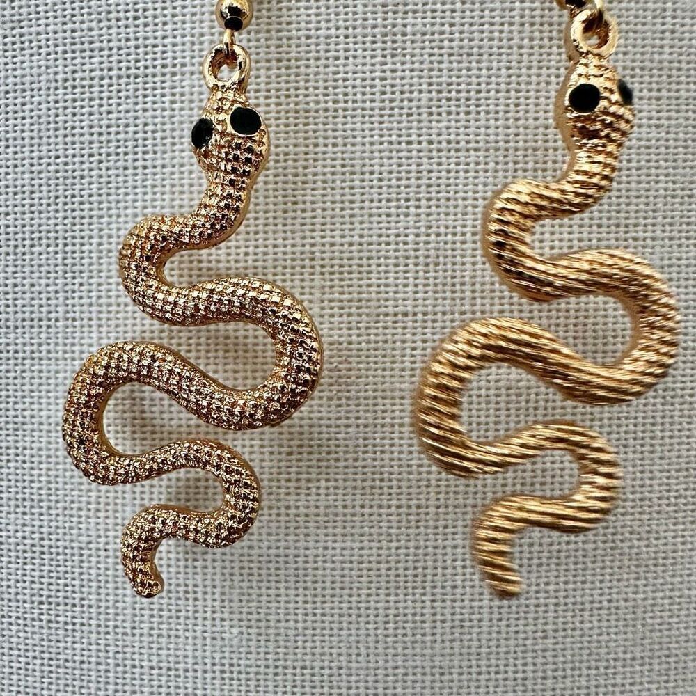 Gold Tone Snake Dangle Earrings with Black Eyes